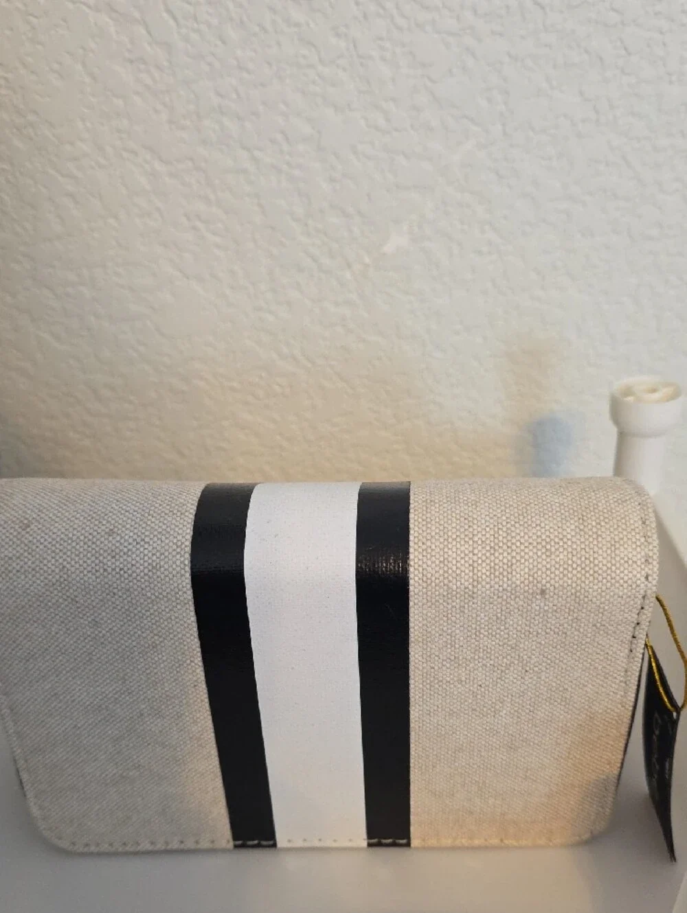 bebe Cream and Black Striped Cosmetic Case